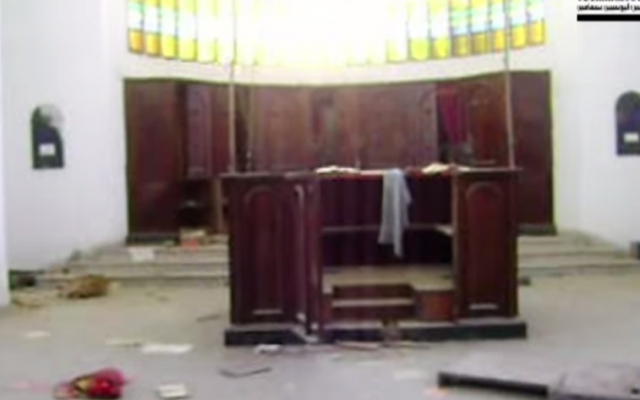 A screenshot taken from amateur footage of the ransacked Beit El synagogue in Sfax, Tunisia (YouTube)