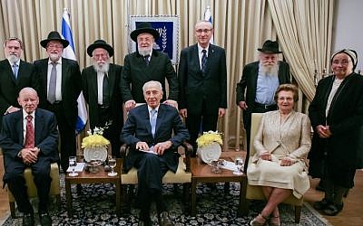 The photograph shows the recipients of the 2014 Katz Award and committee who selected them, alongside President Shimon Peres and Marcos and Adina Katz at a reception held Tuesday at the President's Residence in Jerusalem (photo credit: courtesy)
