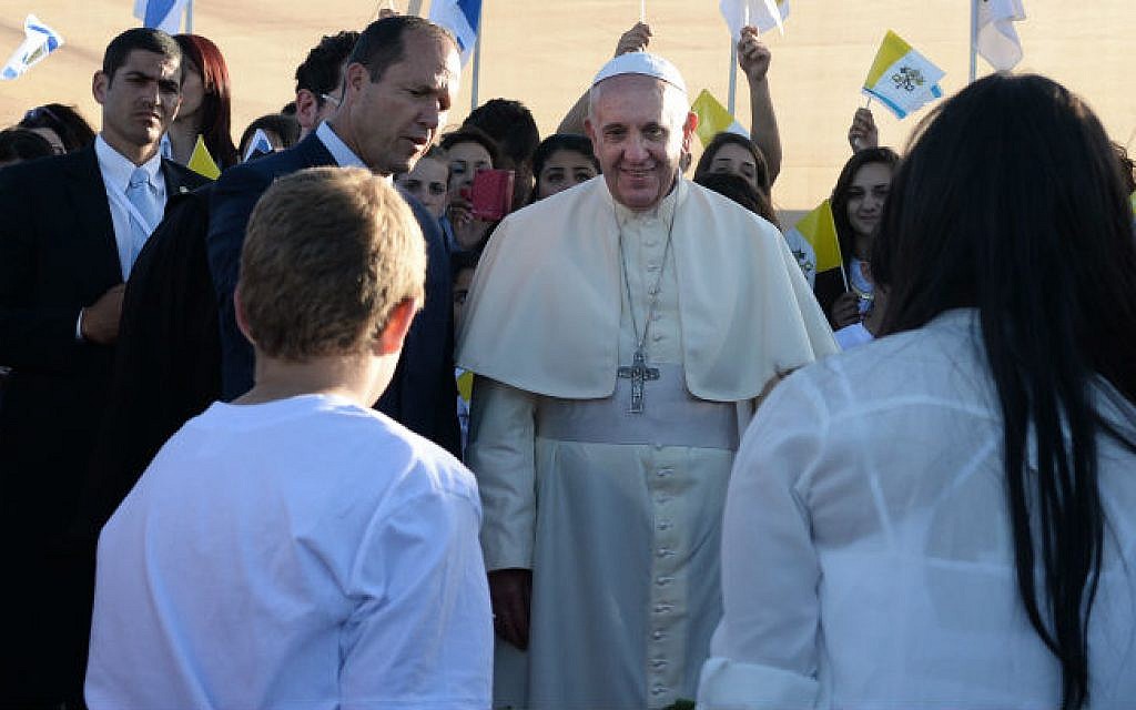 Pope Francis is greeted by Israeli children after landing on Mount Scopus in Jerusalem. Pope Francis arrived in Israel today, May 25, 2014 (photo credit: Kobi Gideon/GPO/Flash90)