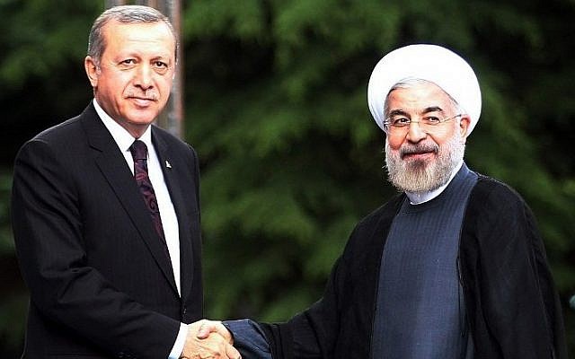 Then-Turkish Prime Minister Recep Tayyip Erdoğan welcomes Iranian President Hassan Rohani to his office in Ankara in 2014 (Photo: AFP)
