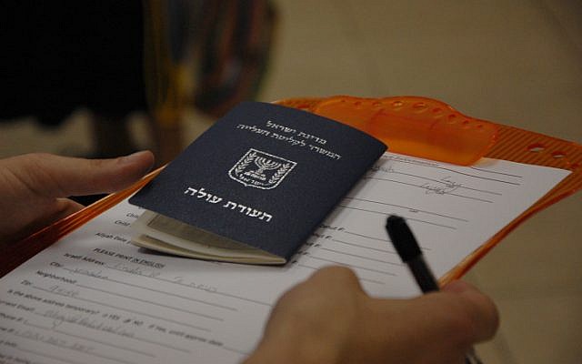 A new Israeli immigrant receiving an identification card,  Jerusalem, May 3, 2010. (photo credit: Rachael Cerrotti/Flash90)