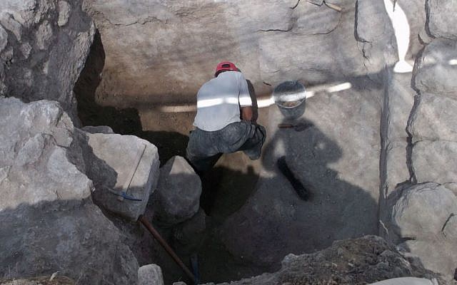 A man working on an archaeological site (illustrative photo: Israel Antiquities Authority/FLASH90)