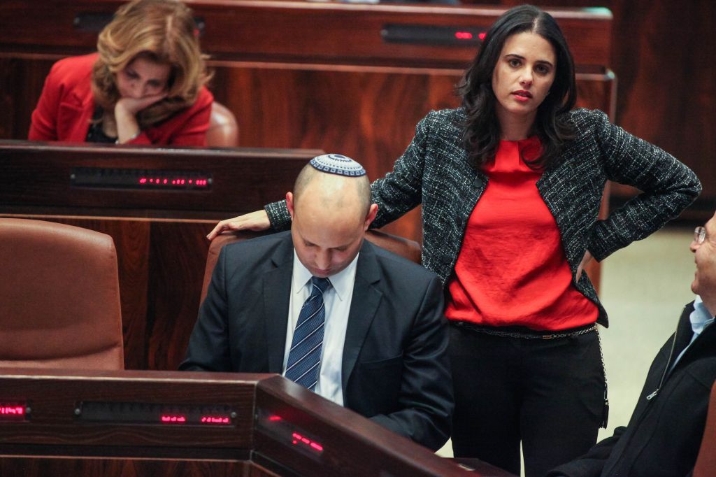 Jewish Home party leader Naftali Bennett and MK Ayelet Shaked attend a plenum session in the Knesset on March 12, 2014. (photo credit: Flash90)