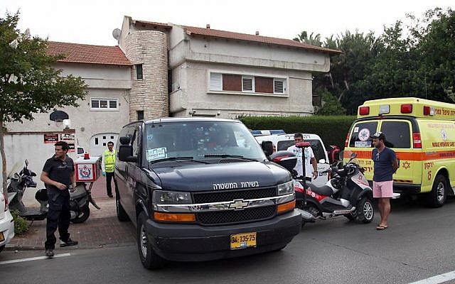 Police and rescue forces are seen outside the house where a two 12-year-old girls drowned to death in a private swimming pool at a home in Savyon on June 3, 2014. (photo credit: Gideon Markowicz/Flash90)