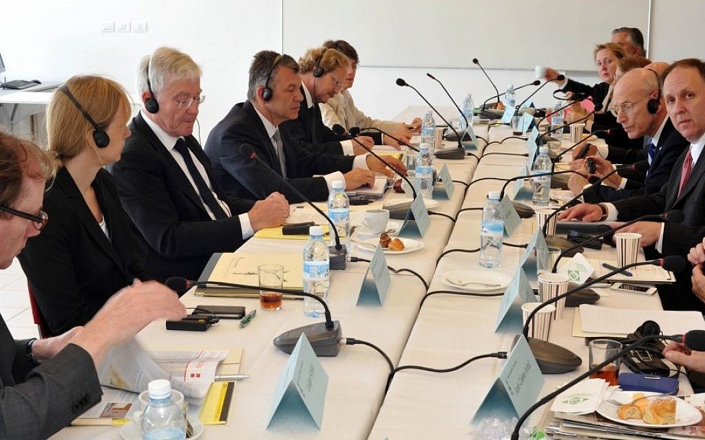 Claims Conference representatives meet with German officials during Holocaust restitution negotiations in Israel in 2013. (photo credit: Courtesy Claims Conference)