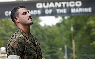In this July 19, 2004 file photo USMC Cpl. Wassef Ali Hassoun prepares himself as he waits to make a statement to a large crowd of media outside the gates to USMC Base Quantico, Va. (photo credit: AP Photo/Dylan Moore, File)