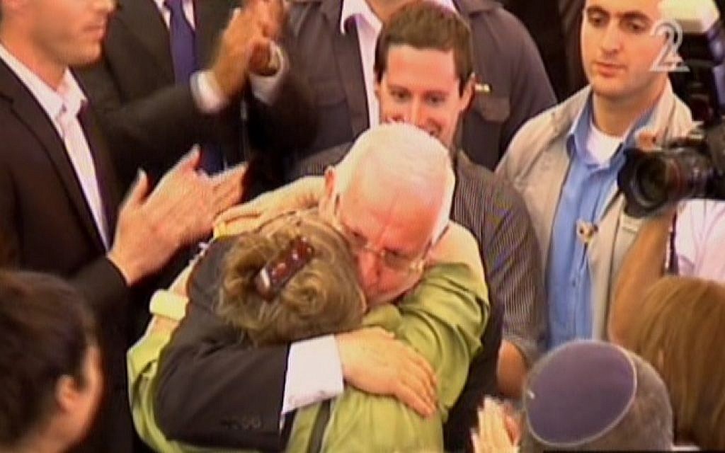 Reuven Rivlin hugging his wife after winning the presidency Tuesday. (Screen capture: Channel 2)