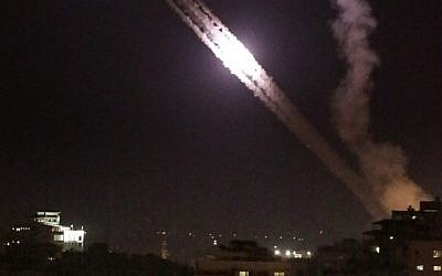 Illustrative: Palestinian missiles are fired from Gaza City toward Israel following Israeli airstrikes on July 17, 2014. (AFP/Thomas Coex)