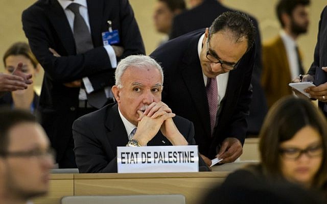Palestinian Foreign Minister Riyad al-Maliki looks on prior to the start of an emergency session of the UN Human Rights Council on the Gaza crisis on July 23, 2014 at the United Nations Offices in Geneva (photo credit: AFP / FABRICE COFFRINI)