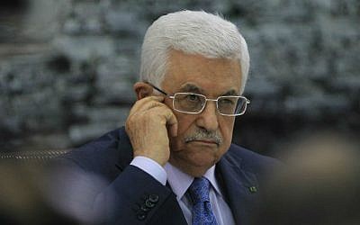 Palestinian Authority President Mahmoud Abbas at a meeting in the West Bank city of Ramallah with members of the Palestine Liberation Organization (PLO) on July 22, 2014 (photo credit: AFP/Abbas Momani) 