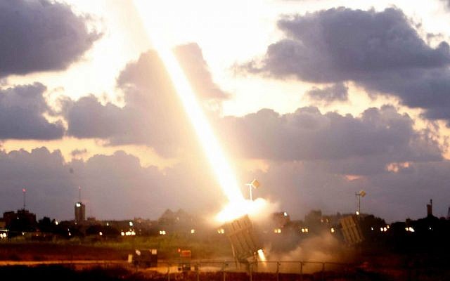 An Iron Dome Missile Defense battery set up near the southern Israeli town of Ashdod fires an intercepting missile on July 16, 2014 (photo credit: Miriam Alster/Flash90) 