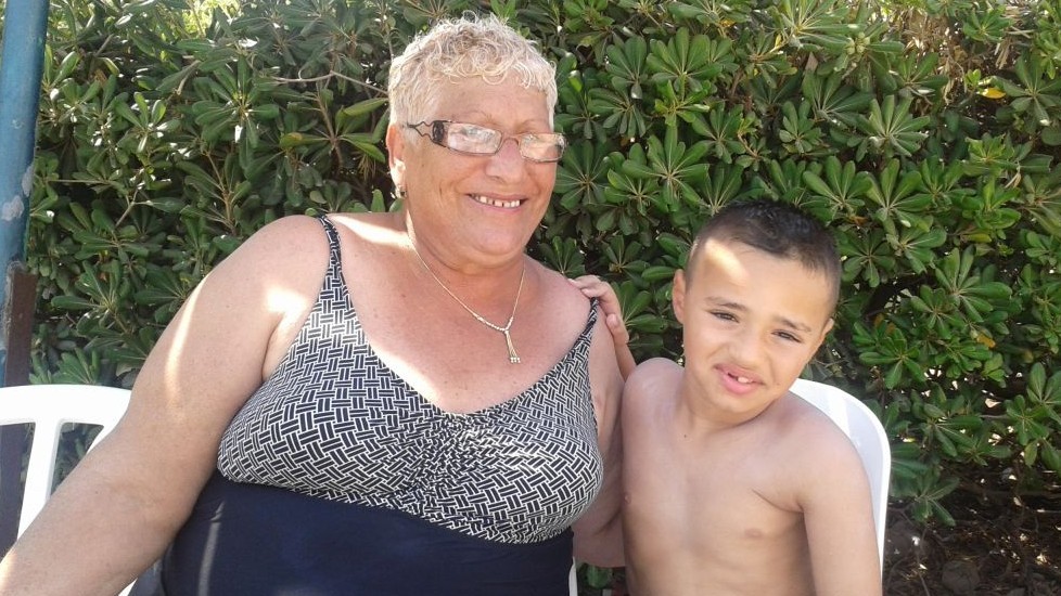 Jacqueline Ivgi and her grandson, Rom, on a OneFamily-sponsored vacation in Tiberias (photo credit: Simone Somekh)