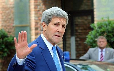 US Secretary of State John Kerry arrives in front of a hotel where closed-door nuclear talks on Iran take place in Vienna, Austria, Monday, July 14, 2014. (photo credit: AP Photo/Ronald Zak)