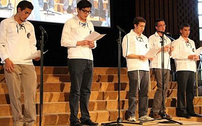 Religious youth group Bnei Akiva sings 'Acheinu' ('Our Brothers') at Toronto memorial service for slain Israeli teens. (Courtesy)