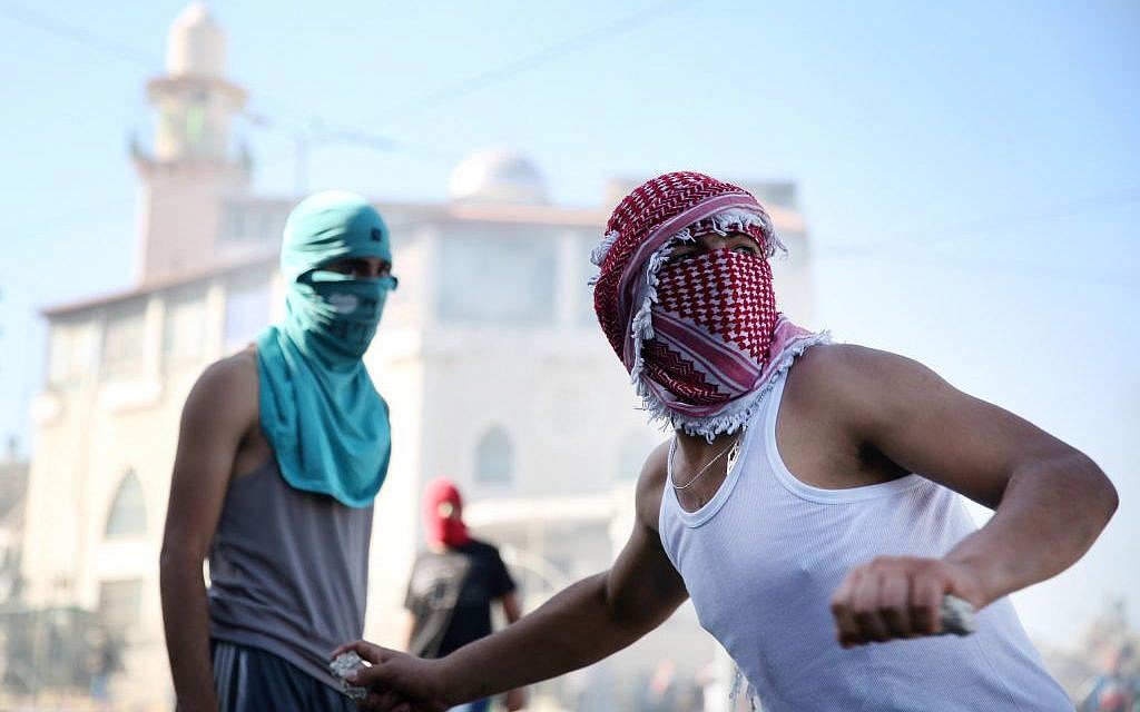 Where wearing the keffiyeh gets you assaulted by the police