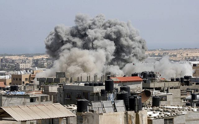 An Israeli missile hits an area in Rafah, southern Gaza Strip, Wednesday, July 9, 2014. (photo credit: Abed Rahim Khatib/Flash90)