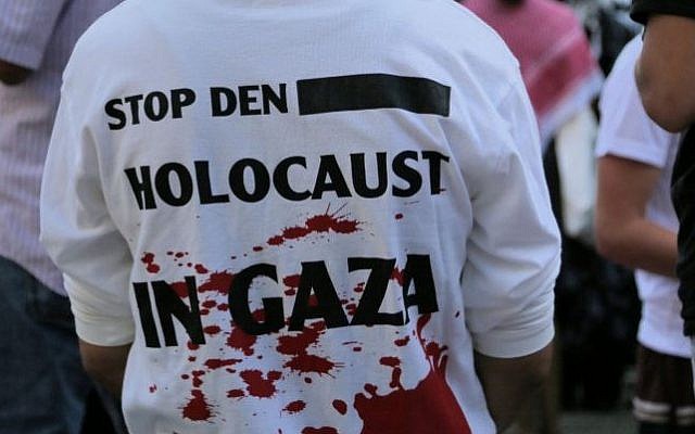Stop the Holocaust in Gaza: A pro-Palestinian protester at a Berlin rally Friday, July 18, 2014. (Micki Weinberg/The Times of Israel)