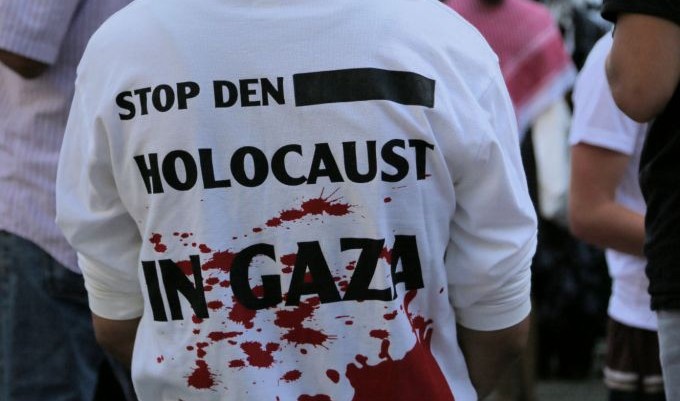 Stop the Holocaust in Gaza: A pro-Palestinian protester at a Berlin rally Friday, July 18, 2014. (Micki Weinberg/The Times of Israel) 