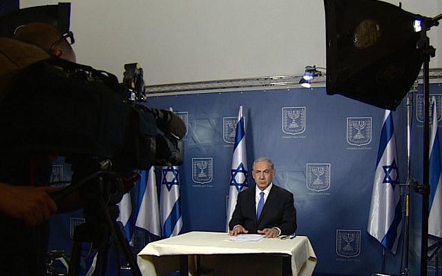 Prime Minister Benjamin Netanyahu during televised interviews with US news networks on July 13, 2014. (photo credit: GPO)