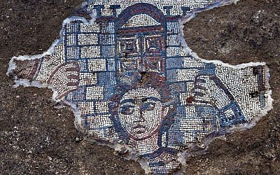 Detail from the Huqoq synagogue's 5th century mosaic showing Samson carrying the gate of Gaza, from Judges 16. (photo credit: Jim Haberman)