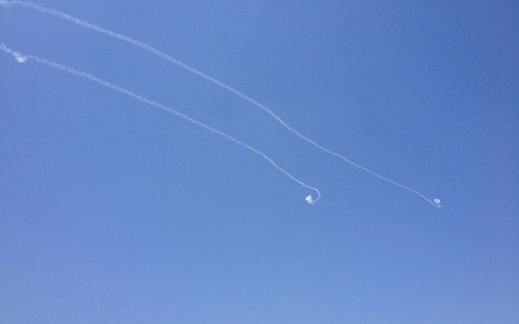 Two rockets being shot down over Sderot Thursday. (photo credit: Mitch Ginsburg/Times of Israel)
