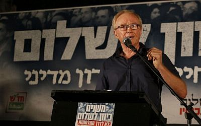 Israeli author David Grossman addresses the crowd at a left-wing rally in Tel Aviv, Saturday night, August 16, 2014 (photo credit: AFP/GALI TIBBON)