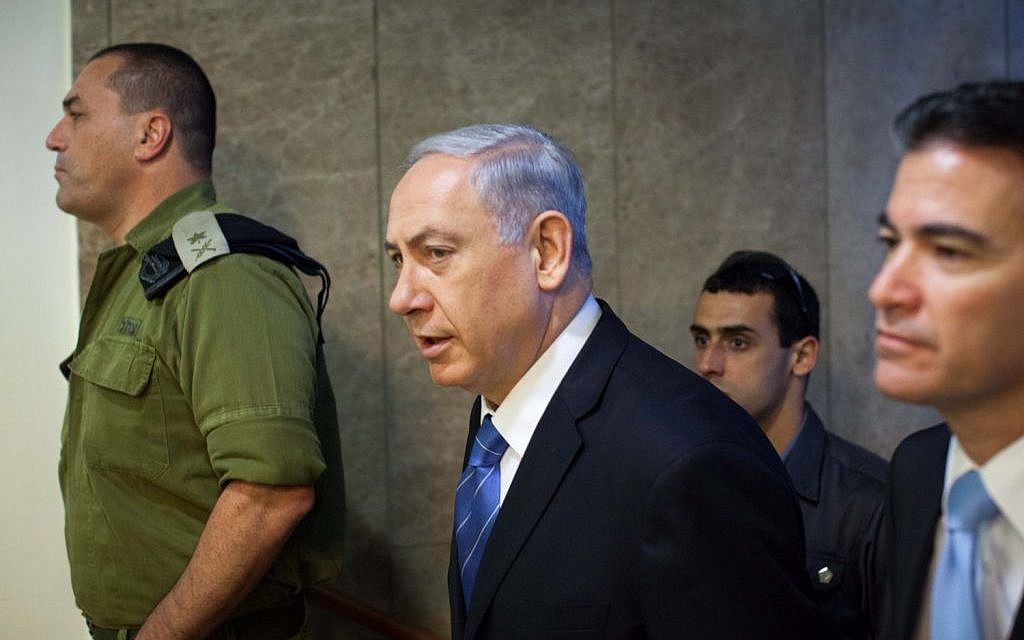 Israeli Prime Minister Benjamin Netanyahu arriving at the weekly cabinet meeting in Jerusalem, August 17, 2014. (photo credit: Emil Salman/Flash90/Pool)