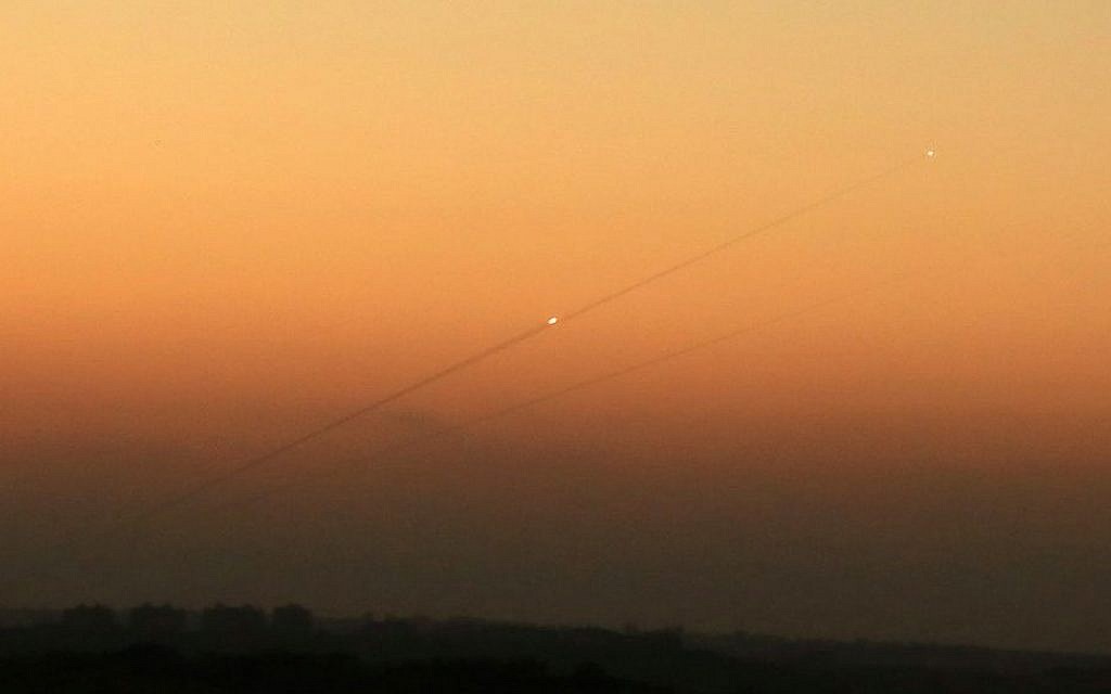 Illustrative: A trail of smoke from a rocket as it was launched from the Gaza Strip toward the southern Israeli city of Ashkelon, August 24, 2014. (Edi Israel/Flash90/File)