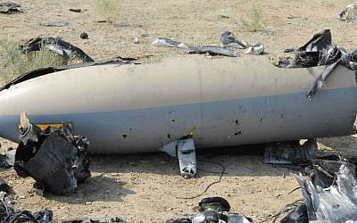 This undated photo released Monday, Aug. 25, 2014 by the Iranian Revolutionary Guards, claims to show the wreckage of an Israeli drone which Iran claims it shot down near an Iranian nuclear site. (photo credit: AP/Sepahnews)