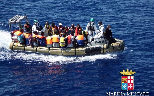 Illustrative photo of a rescue mission to save migrants, September 14, 2014. (photo credit: AFP/Marina Militare)