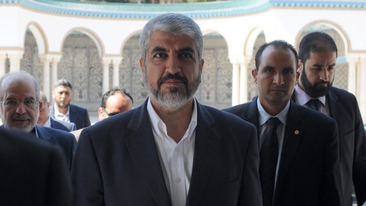 Hamas leader Khaled Mashaal arrives for a meeting with Tunisian president Moncef Marzouki at the Carthage presidential palace on the outskirts of Tunis on September 12, 2014. (Photo credit: AFP/ SALAH HABIBI) 