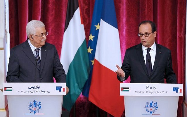 French President Francois Hollande (R) holds a press conference with Palestinian Authority President Mahmoud Abbas at the Elysee presidential palace in Paris on September 19, 2014. (photo credit: AFP/FRANCOIS GUILLOT)