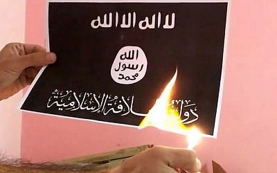 The 'Burn ISIS Flag Challenge' (photo credit: YouTube screenshot)