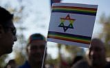 Illustrative: Israelis take part in the annual Pride Parade in Jerusalem on August 1, 2013. (photo credit: Sarah Schuman/Flash90)