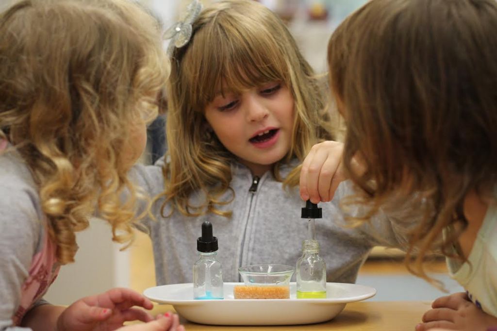 Girls learning about science at Lamplighters Yeshiva in NY's Crown Heights neighborhood. (courtesy)