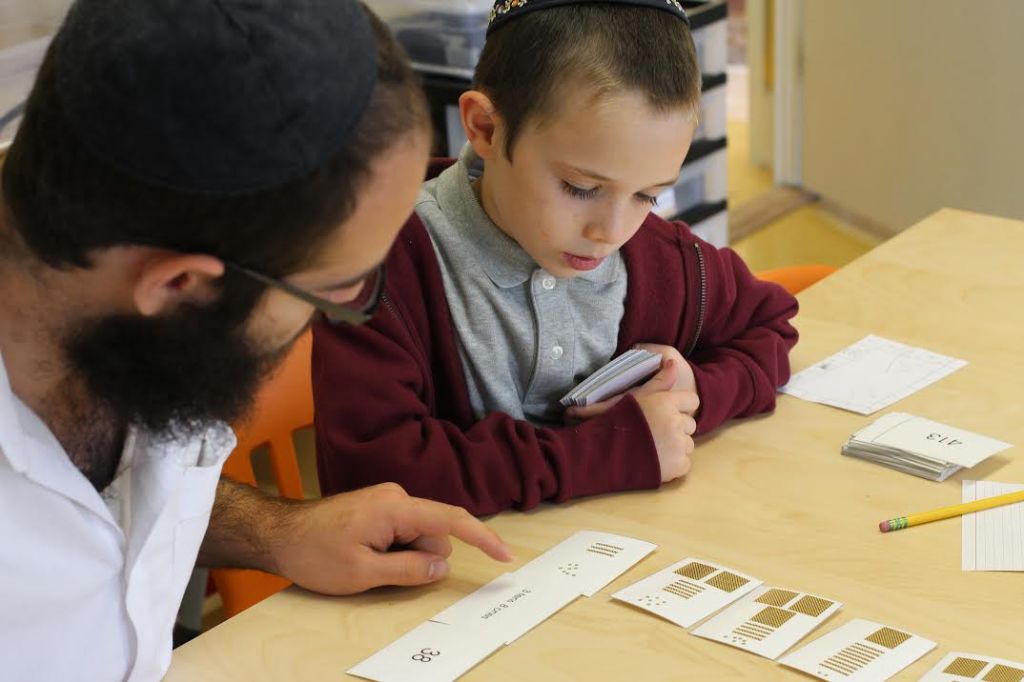 One-on-one lesson with a teacher at Lamplighters Yeshiva. (courtesy)