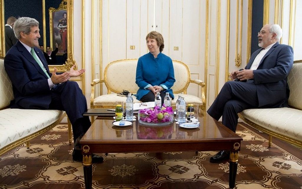 US Secretary of State John Kerry (L), European Union High Representative Catherine Ashton, and Iranian Foreign Minister Mohammad Javad Zarif are photographed as they participate in a trilateral meeting in Vienna, Austria, on October 15, 2014. (Photo credit: AFP/ POOL / CAROLYN KASTER)