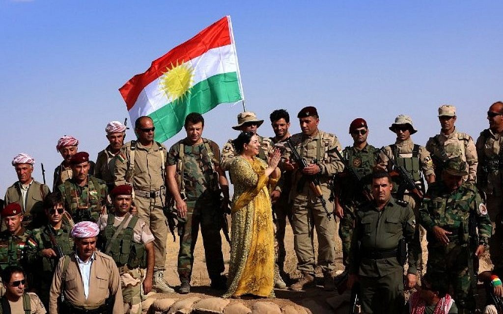 Kurds in desperate fight with IS for Syrian border town 