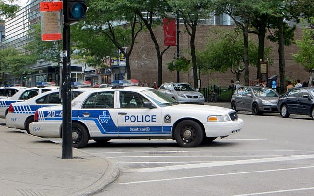 An illustrative photo of Montreal police (photo credit: Flickr/CC BY-SA/Jorge from Brazil)