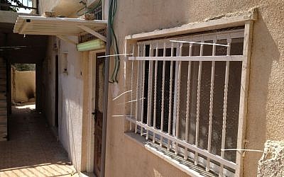Wire netting covers the sold Kararki home in Silwan, East Jerusalem, October 2, 2014 (photo credit: Elhanan Miller/Times of Israel)