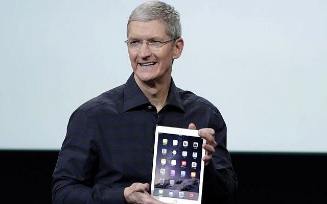 Apple CEO Tim Cook introduces the Apple iPad Air 2 at Apple headquarters in Cupertino, California, October 16, 2014. (photo credit: AP/Marcio Jose Sanchez)