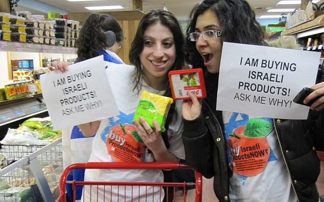 Two David Project-educated New York University students participate in an Israeli products BuyCott to combat Israel Apartheid Week, March 2010. (Courtesy: The David Project/JTA)