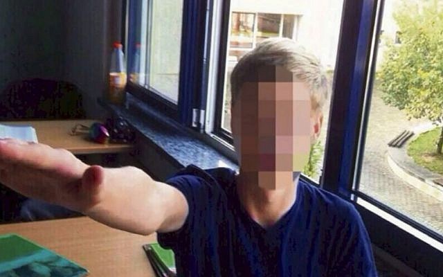 Image found in a secret WhatsApp group of a  student performing a Nazi salute at a Leipzig school. (Europix)