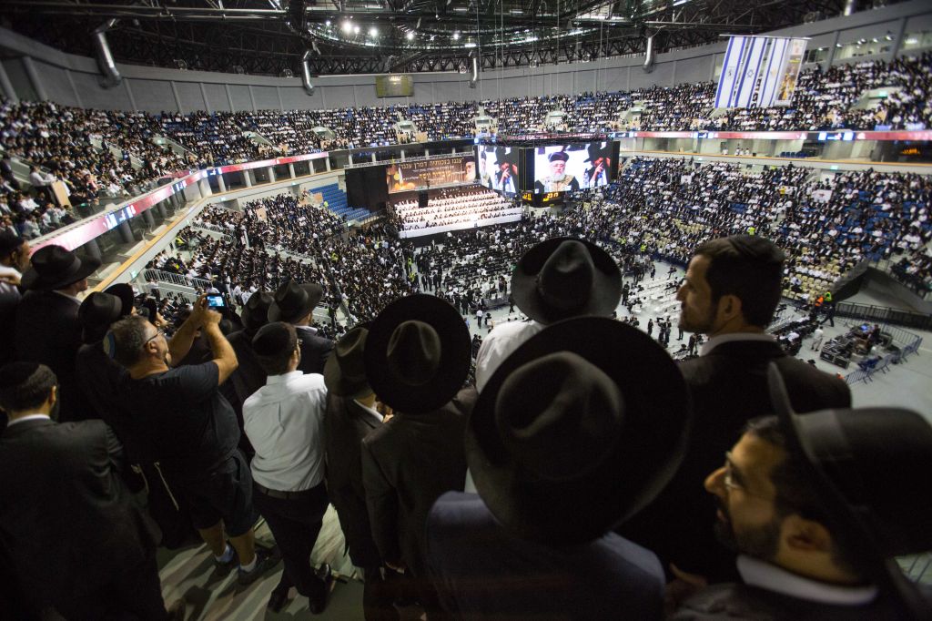 Thousands gather in memory of the spiritual leader of Israel's ultra-Orthodox Shas party Rabbi Ovadia Yosef at the arena in Jerusalem, on September 28 ,2014 (photo: Noam Revkin Fenton/Flash90 )