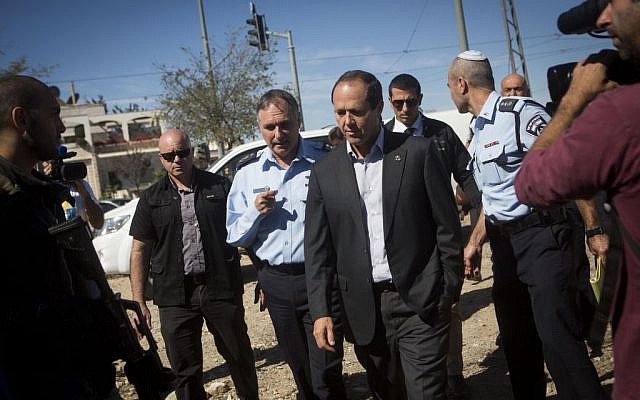 Jerusalem Mayor Nir Barkat, center, touring East Jerusalem with police officials on October 22, 2014. (photo credit: Miriam Alster/Flash90)