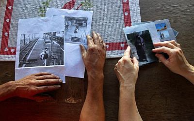 In this Thursday, Oct. 2, 2014 photo, Kamel Ali Mehenni, left, and his wife, Severine, hold pictures of their daughter Sahra at their home in Lezignan Corbieres, France. At left is a frame grab taken from a security camera showing Sahra at the Carcassonne railway station on March 11, 2014, the day she left her home on her way to Syria. (photo credit: AP Photo/ Fred Scheiber)