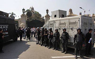 Egyptian security forces stand guard at Cairo University in Cairo, Egypt, on Sunday, October 12, 2014. (photo credit: AP Photo/El Shorouk, Aly Hazzaa)