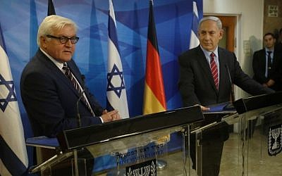 Prime Minister Benjamin Netanyahu and Germany's Foreign Minister Frank-Walter Steinmeier deliver joint statements to the media before their meeting in Jerusalem on November 16, 2014. (Photo credit: AFP  / POOL / RONEN ZVULUN)