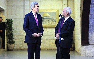 Palestinian Authority lead negotiator Saeb Erekat, right, and US Secretary of State John Kerry in Ramallah, West Bank, on January 4, 2013. (State Department)