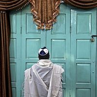 Illustrative: In this photo from November 20, 2014, an Iranian Jewish man prays at the Molla Agha Baba Synagogue, in the city of Yazd 420 miles (676 kilometers) south of capital Tehran, Iran. (AP Photo/Ebrahim Noroozi)